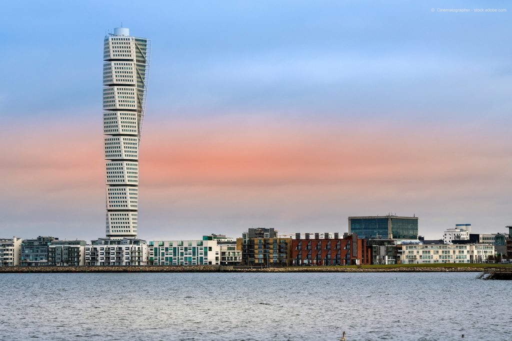 MALMO, SWEDEN - FEBRUARY 17, 2018: Turning Torso Building in West Harbour area in Malmo, Sweden. The tower is beside the Oredund bridge the new landmark of Malmo.